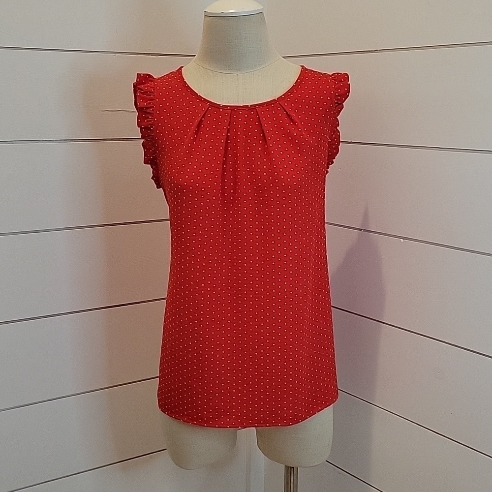 TACERA medium ruffled shoulders on sleeveless blouse